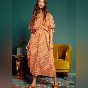 Bucket List Geometric Floral Print V-Neck Midi Dress. Color: Orange